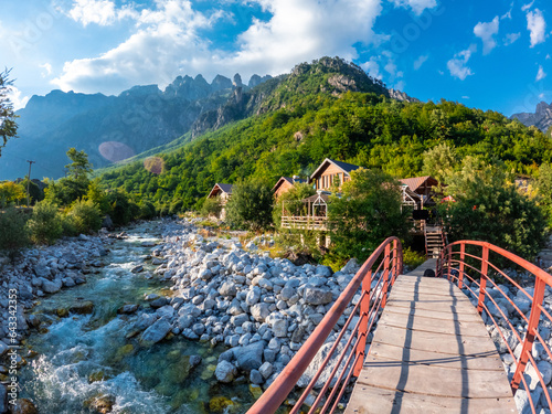 Red bridge along the river of Valbona Valley, Theth National Park, Albanian Alps, Albania