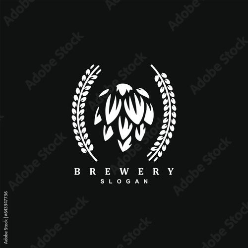 Vintage retro beer brewery hop with wheat logo design badge isolated on black background