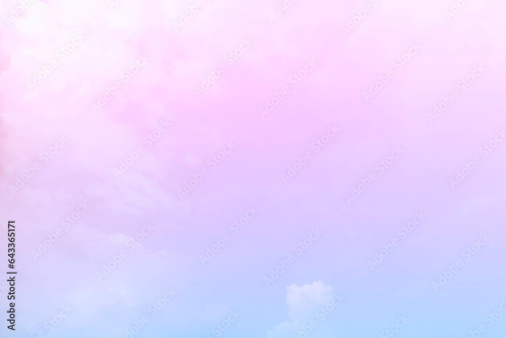 The background of the sky with natural clouds on the gentle twilight atmosphere with pastel rainbow gradations blends pink, purple and blue like subtle, and the faded white mist blur adds soft. The background of the sky with natural clouds on the gentle twilight atmosphere with pastel rainbow gradations blends pink, purple and blue like subtle, and the faded white mist blur adds soft.