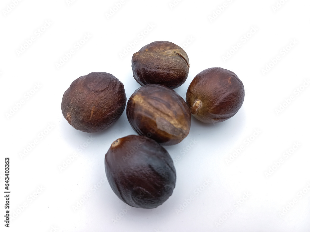 Five Whole Nutmeg isolated On White Background Five Whole Nutmeg isolated On White Background