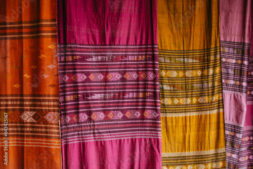 Native woven fabrics of northern Thailand. Colorful traditional fabrics background.