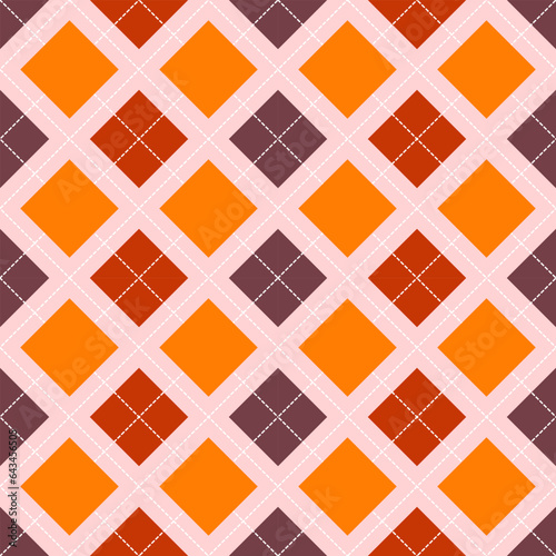 argyle seamless vector pattern in autumn colors. Traditional geometric vector argyle stitched background art for gift wrapping, socks, sweater, jumper, or trendy classic fashion