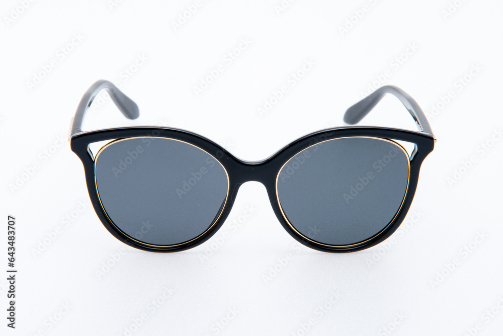Fototapeta premium Fashion sunglasses black frames on the white background.