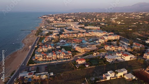 Resorts and Hotels at Crete's Coast, Chersonissos - Aerial Orbit photo