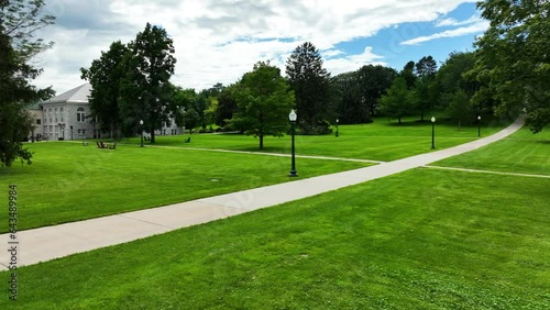 Lush greens of grasses and trees on campus. photo