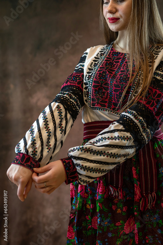 Portrait of young pretty woman wear ethnic clothes embroidered blouse or dress with handkerchief
