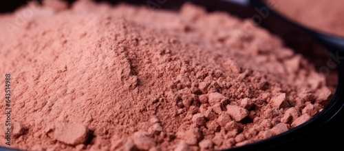 Close up texture of compact face powder bronzer brusher with a circle copy space on a makeup background Selective focus photo