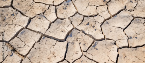 Cracked soil in hot summer dry season patterns of dried earth ground