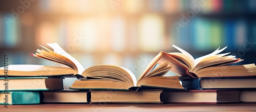 A pile of books with an ope...