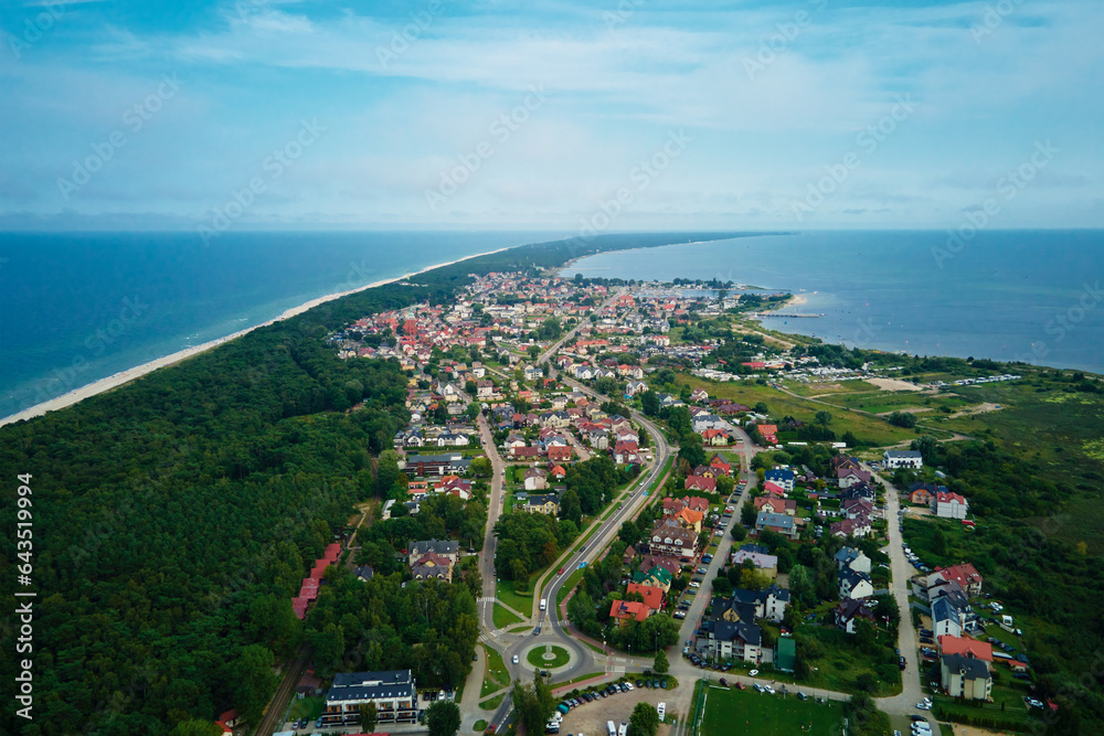 birds-eye-view-of-sea-landscape-with-sandy-beach-and-jastarnia-city-on