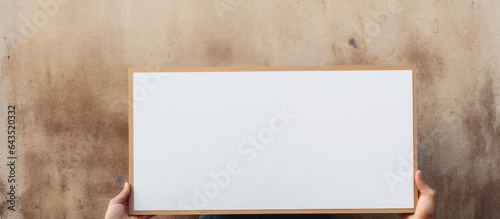 Person holding blank sign i...