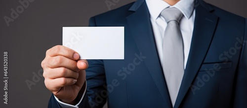 Businessman holding empty c...