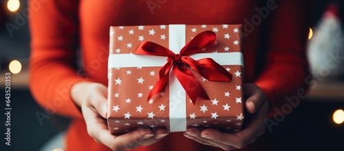 A young woman s hands holdi...