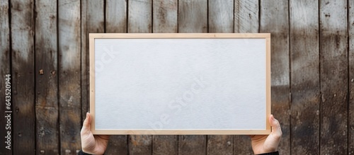 Person holding blank sign i...
