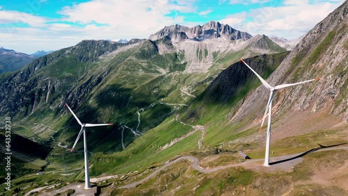 Wind turbines, Wind Wheels for alternative power generation in beautiful mountain panorama. Wind power generates alternative and clean energy photo