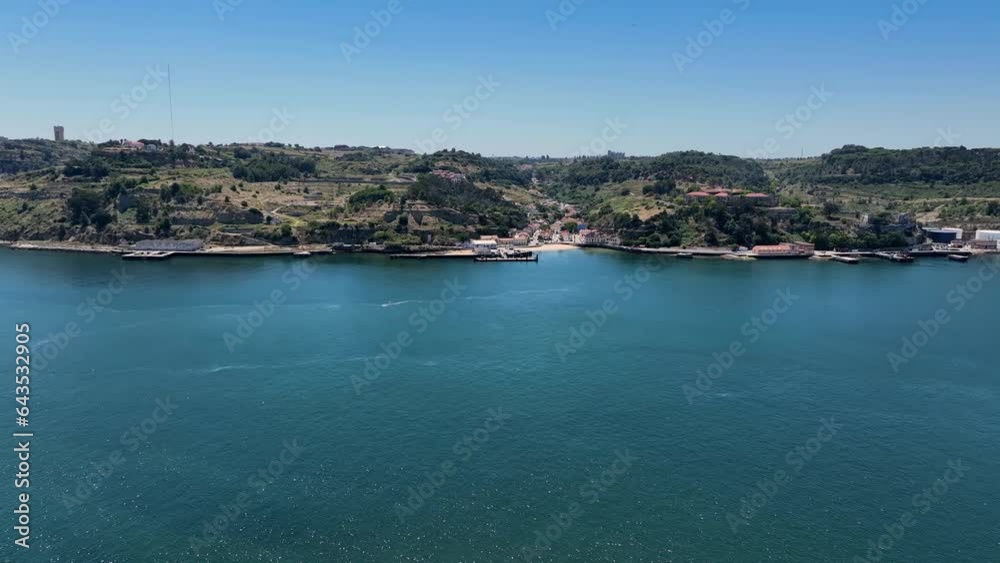 Drone shot from crossing over the river Tejo with a drone. Belém to Porto Brandao. Drone shot from crossing over the river Tejo with a drone. Belém to Porto Brandao.