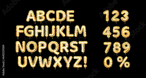 Set of golden balloon alphabet and numbers, isolated on black background.	