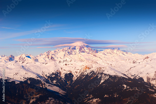 Mont Blanc mount with clouds at sunset. View from Meribel village  France. Winter Alps mountains