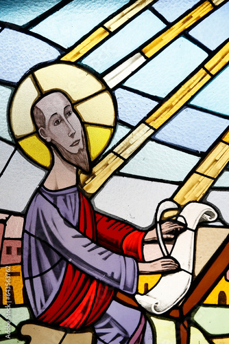 Saint Paul's catholic cathedral, Abidjan, Ivory Coast. Stained glass depicting St Paul writing. photo