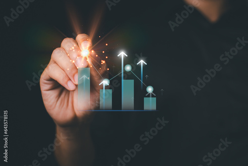 Businessman draw growth graph stock  market economy  statistic showing of profit analyzing financial exchange on digital with trade chart finance data concept and investment business plan on  strategy