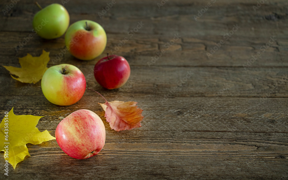 Close up apples on wooden rustic background with copy space. Harvest and Thanksgiving. Close up apples on wooden rustic background with copy space. Harvest and Thanksgiving.