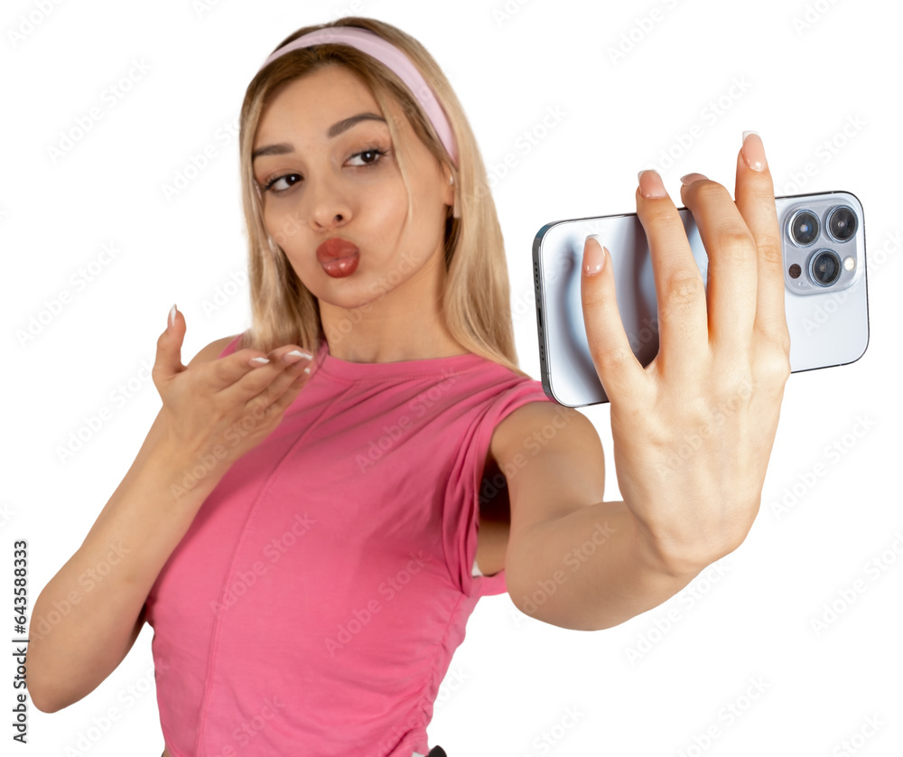 Sending air kiss, young caucasian blonde girl sending air kiss. Holding