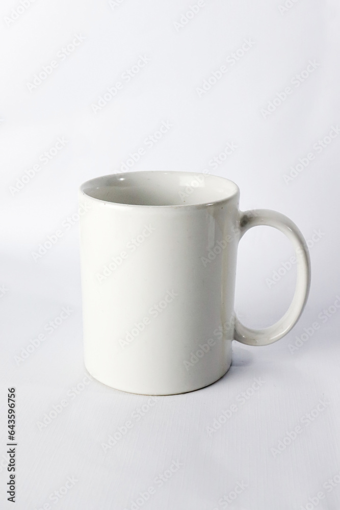 an empty ceramic white cup  isolated on white background.