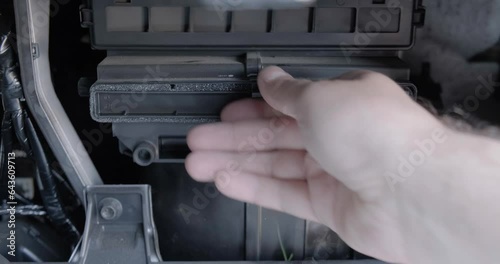 Replacing cabin air pollen filter with activated carbon, antibacterial, anti-allergen, for car interior. Auto, replacement, spare part.