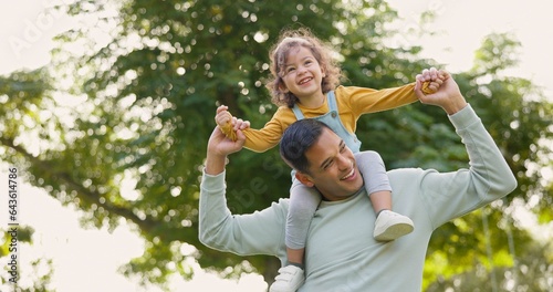 Happy, piggyback and father with girl in nature, bonding and having fun. Smile, dad and carrying child on shoulders, play and enjoying quality family time together outdoor in park with love and care.