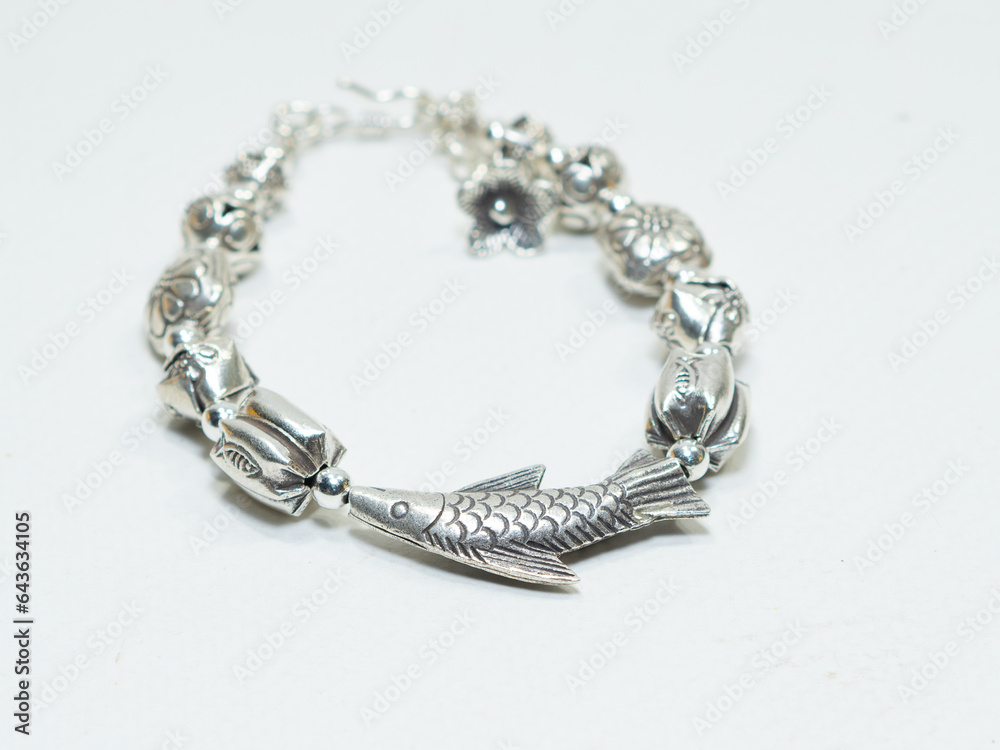 Luxury silver jewelry on white background Luxury silver jewelry on white background