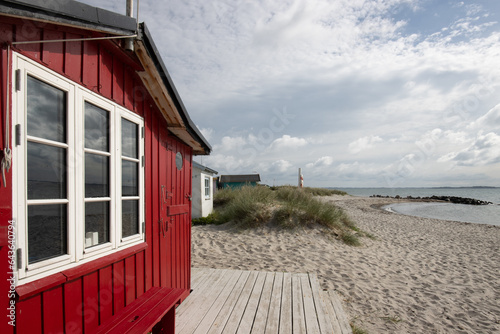 Traditional red colored beach hut in Eriks Hale, Marstal, Ærø, Denmark. photo