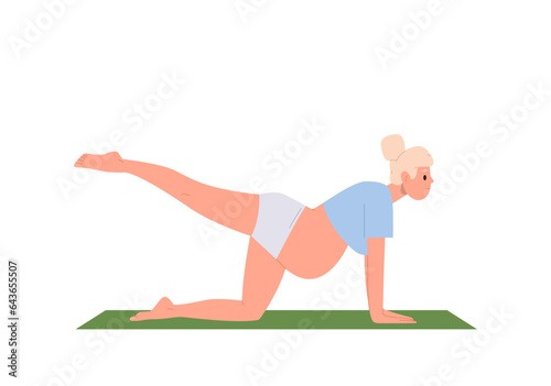 Young beautiful pregnant woman doing fitness exercise, practicing yoga, stretching leg on mat