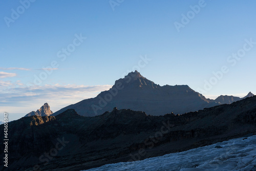 View of Grivola mountain among Valsavarenche and Cogne valley from Gran Paradiso glacier at sunrise