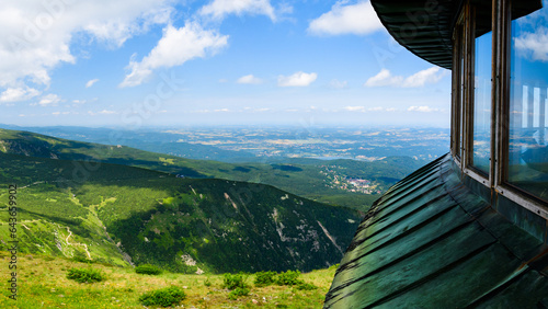 Fototapeta Naklejka Na Ścianę i Meble -  Giant Mountains, mountain panorama from the hiking trail to the top of Sniezka. View of the vast mountain slopes and trails on a sunny summer day.