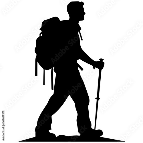 man hiking mountain with stick