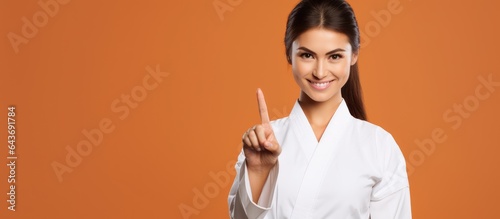 Smiling young woman in kara...