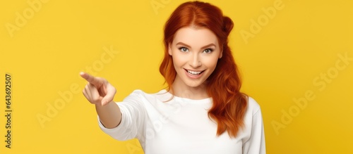 Red haired Caucasian girl p...