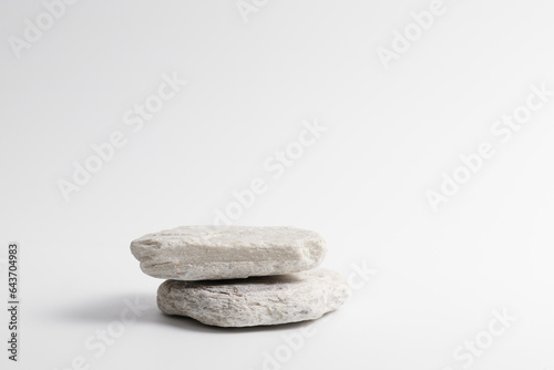 Gray flat textured stone pedestal on white background, template for mock-up, banner. Minimal concept, empty podium display product, presentation scene .