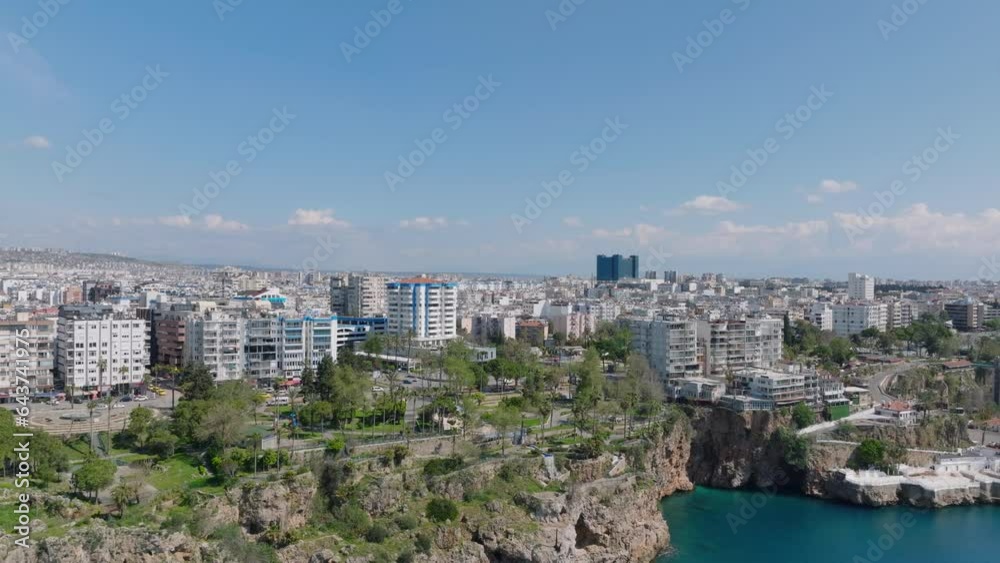 Aerial view of rows of white multistorey apartment buildings in residential urban borough in large city. Antalya, Turkey Aerial view of rows of white multistorey apartment buildings in residential urban borough in large city. Antalya, Turkey