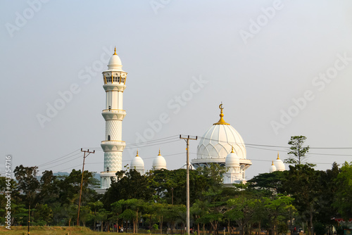 White mosque with blue sky background