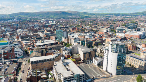 Aerial view on buildings and Lagan River in City center of Belfast Northern Ireland. Drone photo  high angle view of town