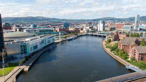 Aerial view on buildings and Lagan River in City center of Belfast Northern Ireland. Drone photo, high angle view of town