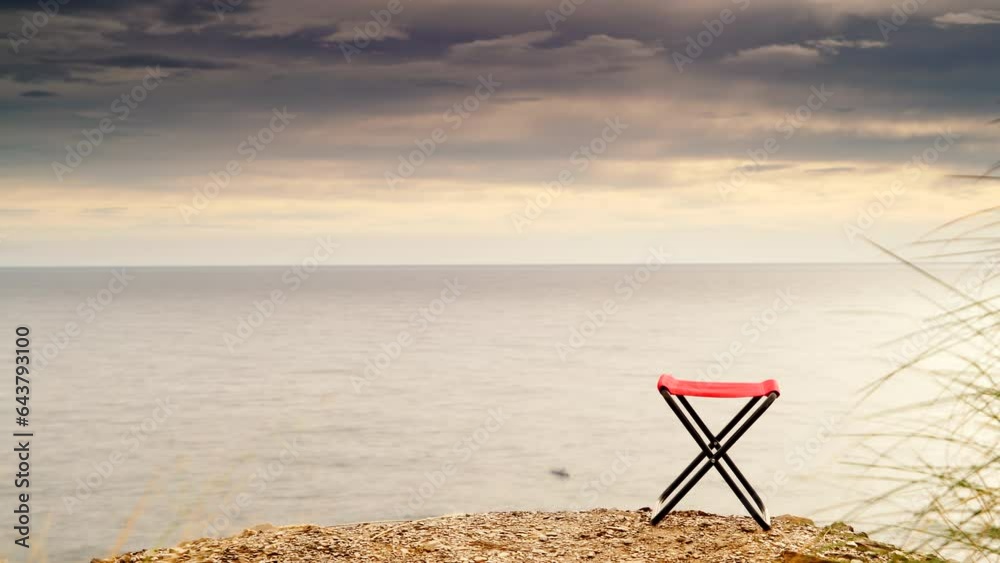 Empty folding camp chair on beach nature. Holidays relaxation on trip. Vacation in the camping. Freedom and travel concept. Empty folding camp chair on beach nature. Holidays relaxation on trip. Vacation in the camping. Freedom and travel concept.