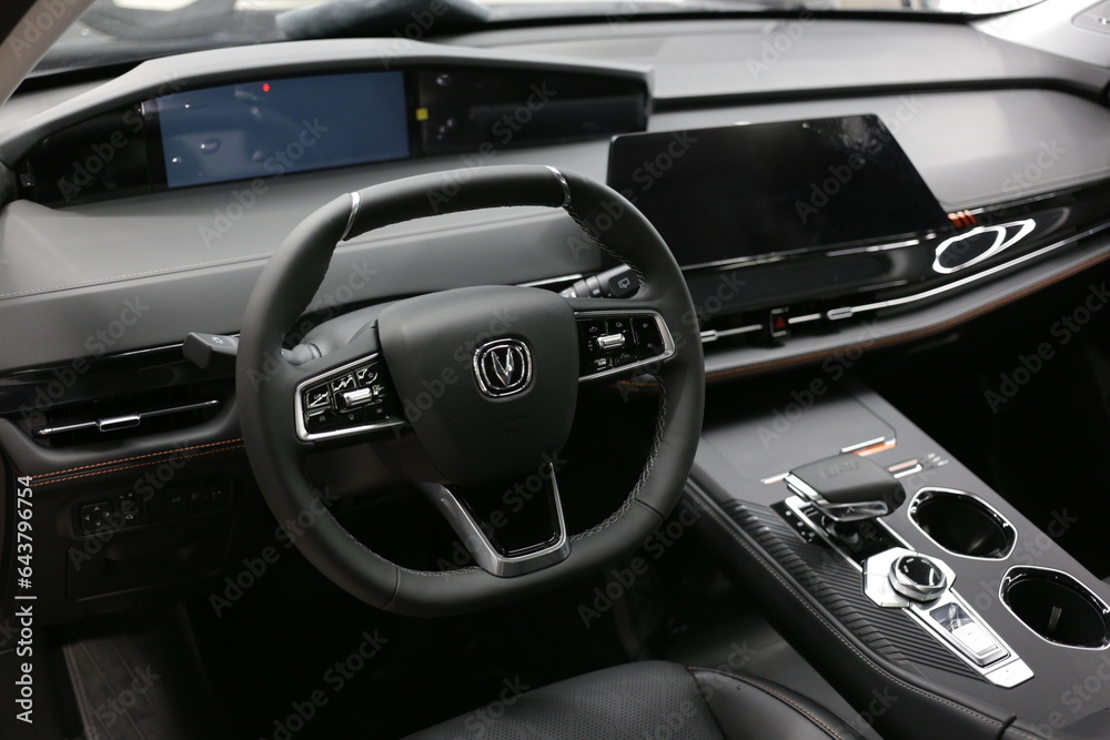 Changan UNI-K. Vehicle interior SUV car. Car logo. Showroom of the ...