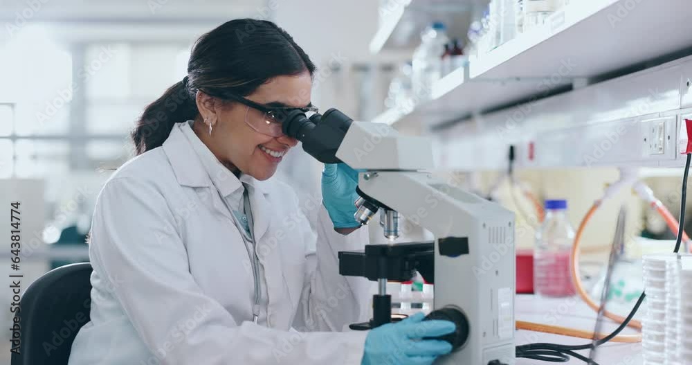 Microscope, happy woman and medical laboratory for science research, dna analysis or studying chemical development. Scientist, biotechnology and check lens to review investigation, test or assessment