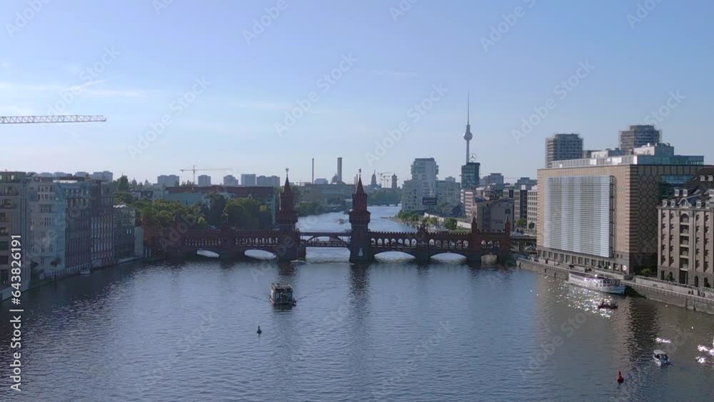 Dramatic aerial view flight drone. Berlin Oberbaum bridge, Tv Tower river Spree Dramatic aerial view flight drone. Berlin Oberbaum bridge, Tv Tower river Spree