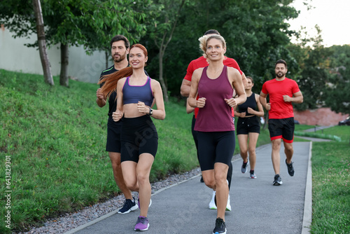 Group of people running outdoors. Active lifestyle