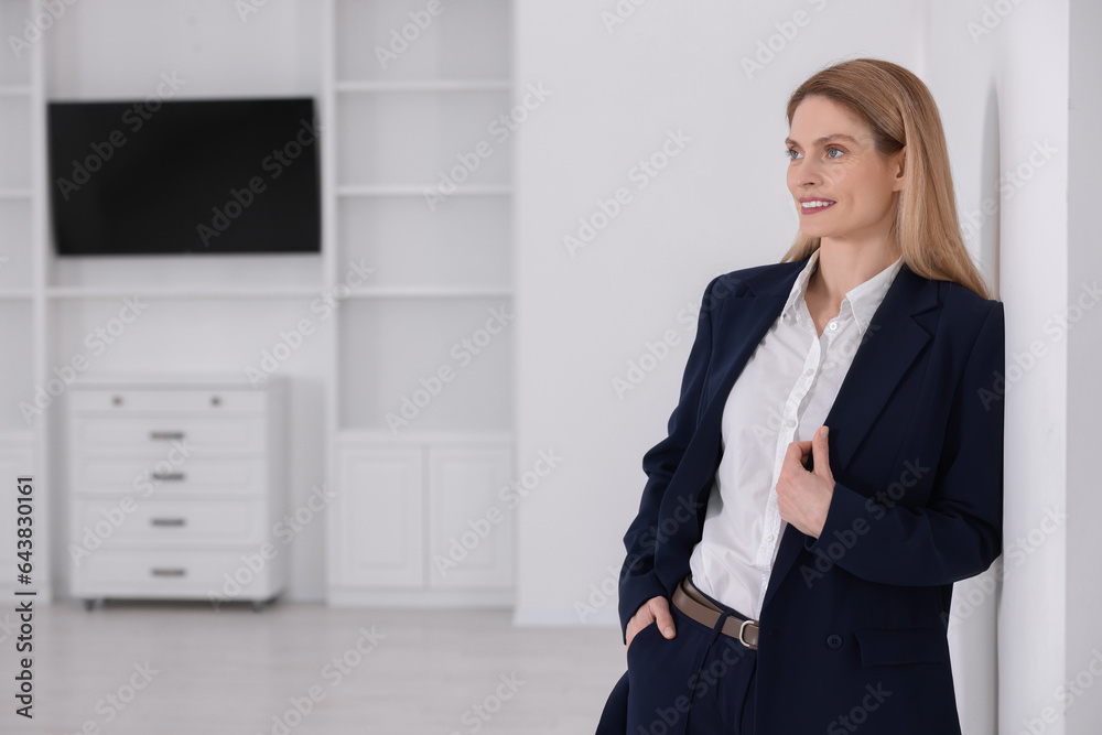Happy real estate agent in new apartment. Space for text Happy real estate agent in new apartment. Space for text