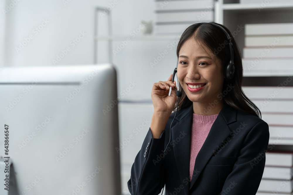 Asia call center with headset and microphone working on laptop Female entrepreneurs serving customers, business information, inquiries Support call center representatives help customers. Asia call center with headset and microphone working on laptop Female entrepreneurs serving customers, business information, inquiries Support call center representatives help customers.