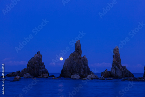 Hashigakeiwa and full moon, Japan,Wakayama Prefecture,Higashimuro District, Wakayama,Kushimoto town photo